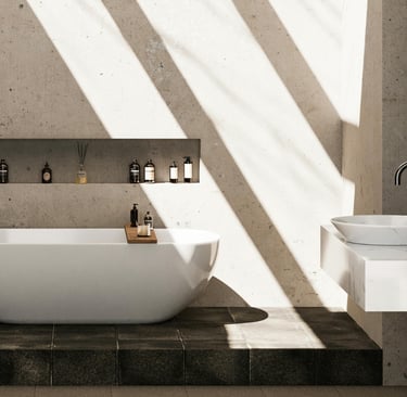 Stone and plaster carrying color in a French Mediterranean bathroom.