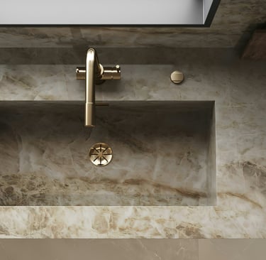 Stone basin extending the floor material in a French Mediterranean bathroom.