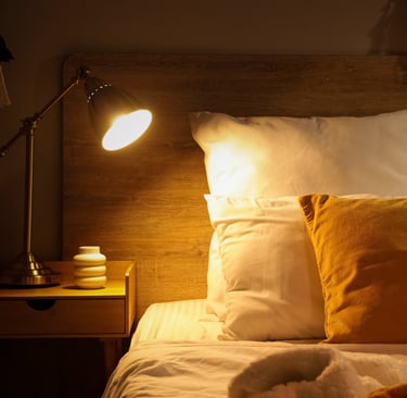 Bedroom palette holding under low evening light in a French Mediterranean room.