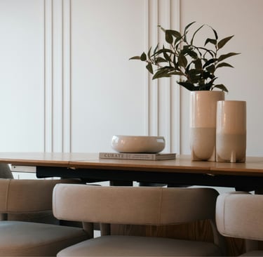 A French Mediterranean dining room in warm tonal light.