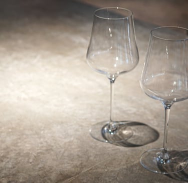 Honed stone dining tabletop in a French Mediterranean room.