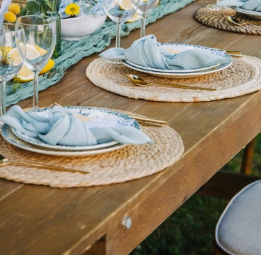 Linen, wood and stone meeting at a dining chair, French Mediterranean.
