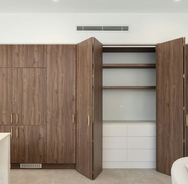Storage column flush with wall in a French Mediterranean kitchen!