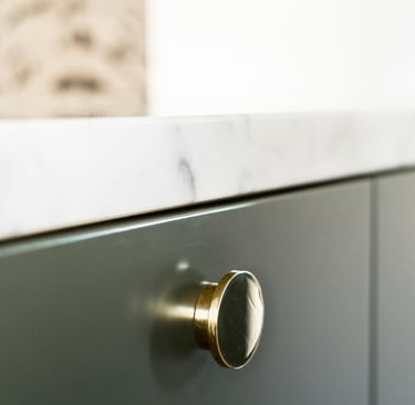 Quiet closed cabinet front in a French Mediterranean kitchen.