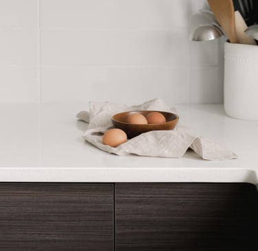 Continuous stone counter in a French Mediterranean kitchen.