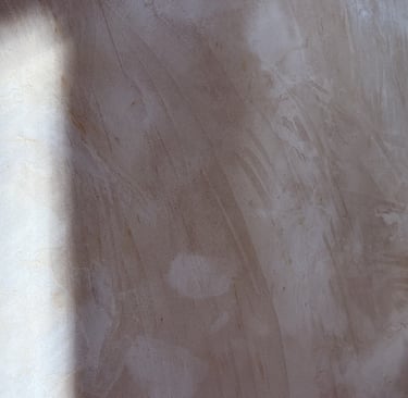 Limewash wall showing soft tonal movement in afternoon light.