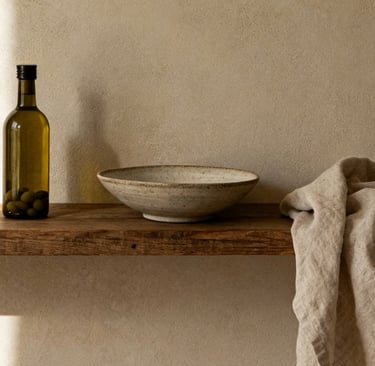 Warm white plaster in a French Mediterranean living room.