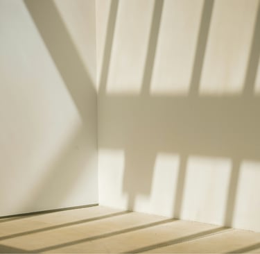 Warm white mineral paint walls and stone floor in a Mediterranean new build.