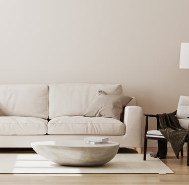 Limewash wall, wooden floor and linen — natural materials in a new build.