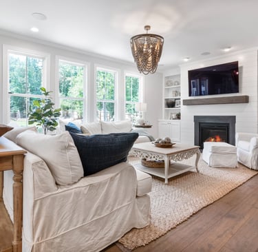 A living room where furniture has enough space around it to read individually.