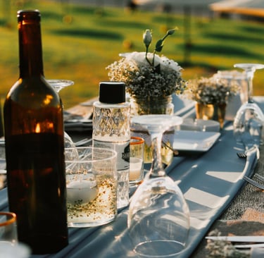 Dinner table in a French Mediterranean garden at the hour of use.