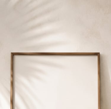 Warm white limewash wall catching afternoon light in a Mediterranean interior.