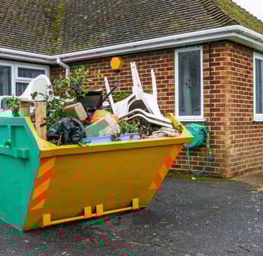 a dumpster sitting in front of a house