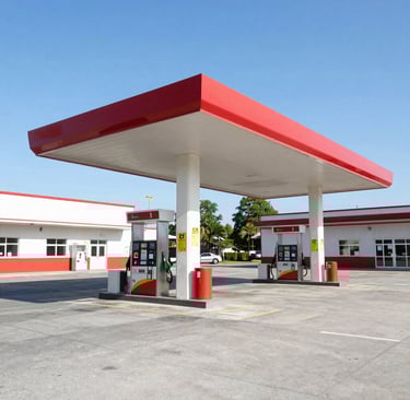 A street sign hanging from the side of a building