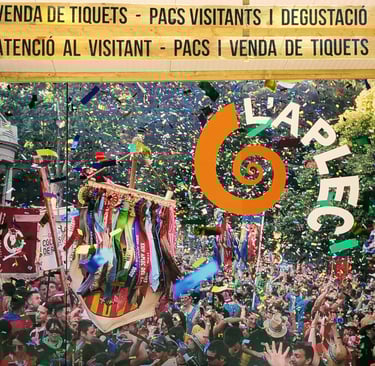 A vibrant festival booth at L’Aplec del Caragol featuring colorful decorations and confetti.