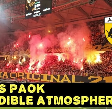 AEK Athen Fan im Stadion jubelt leidenschaftlich während eines Spiels, Fahnen wehend, Gesänge schallend, in voller Fan-Ausrüs