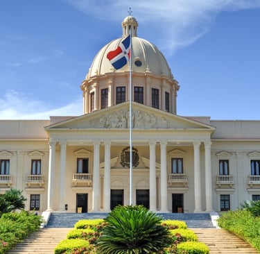 National Palace of the Dominican Republic with flag and blue sky in Santo Domingo