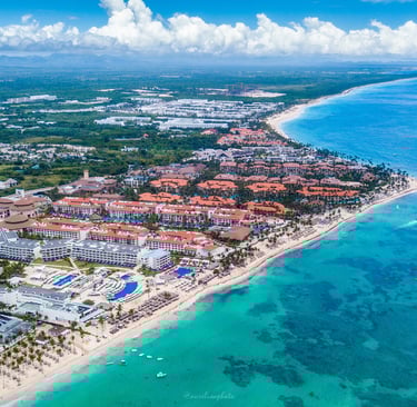 Aerial view of Bávaro beach resorts and turquoise sea in Punta Cana, Dominican Republic