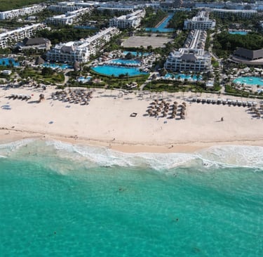 Aerial view of Punta Cana all inclusive resort with pools and beachfront amenities