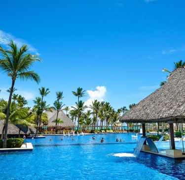 Luxury adults-only resort with pool and palm trees in Punta Cana
