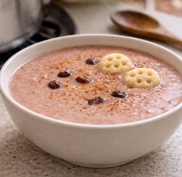 Dominican Habichuelas con Dulce red bean dessert with coconut milk, raisins, cinnamon, and milk biscuits