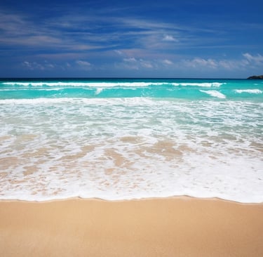 Turquoise waves and golden sand at Playa Macao in Punta Cana, Dominican Republic