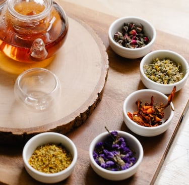 tea with different herb on side