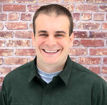 a man in a green shirt and a white shirt