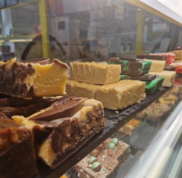 Fudge display. Chocolate Orange, Caramel, Chocolate mint, Vanilla.