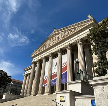 The national archives, a white building with columns in a classical format