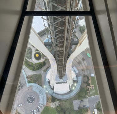facing down through the glass floor of the space needle
