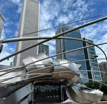 A large frame structure in front of a metal stage