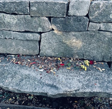 a bench at the salem witch trials memorial