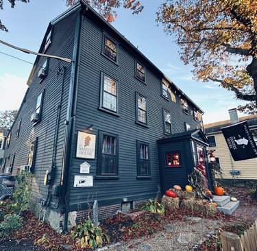 The Daniels House in Salem, a black clapboard three story house