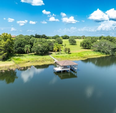 a boat dock with a small boat on the water