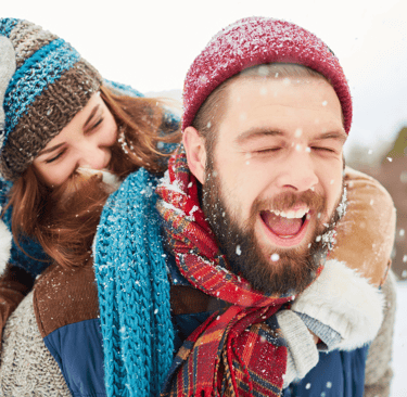 A Calgary couple navigating winter stress and having fun in the snow/embracing the cold weather.