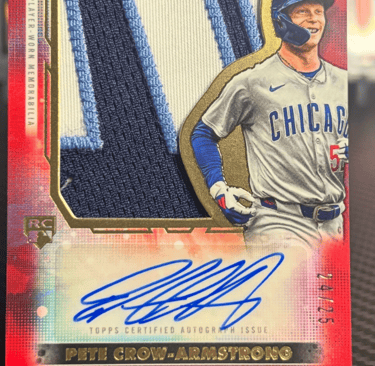 "PCA rookie autograph patch card featuring a player’s on-card signature and multi-textured fabric pa