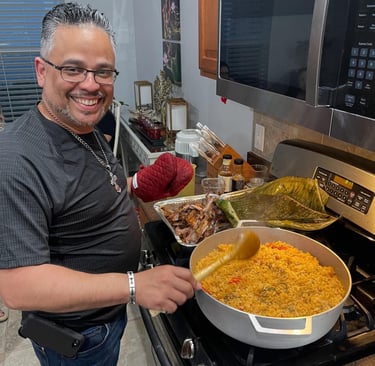 A man cooking Puerto Rican arroz con gandules