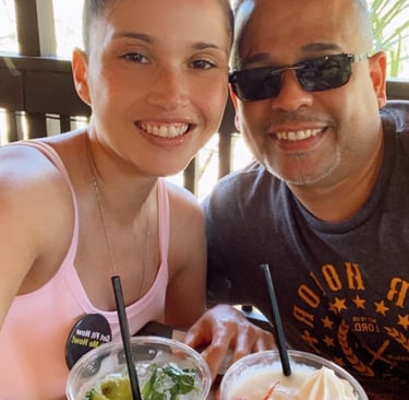 a man and a woman with tipical drinks in puerto rico