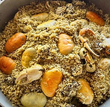 a potted rice dish with crabs, puerto rican arroz con jueyes