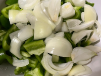 a bowl of vegetables and vegetables on a white plate