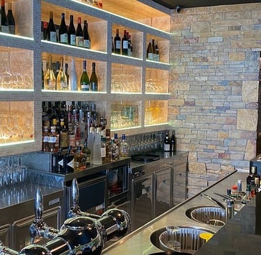 a bar with a bar with a bar stool and a bar with a bar stool