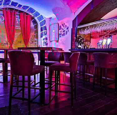 a bar with a bar stool and a bar stool
