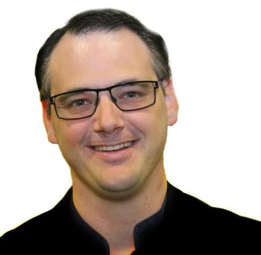 a man in a black shirt and glasses