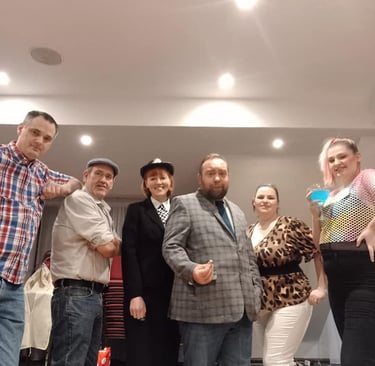 a group of people standing in a room