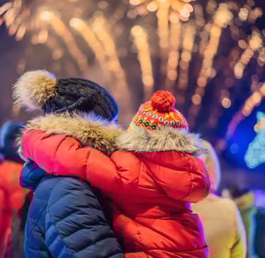 Father holding child enjoying Ballarat Winter Festival 2025 – family moment near winter lights