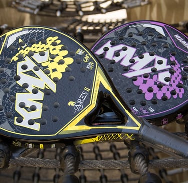 2 rackets laying on a net