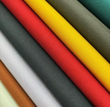 A selection of colorful RPET fabrics, a sustainable material option by King Fly.