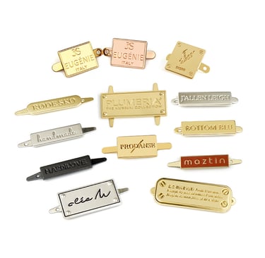 Elegant and polished branded metal hardware for premium custom bags, made by King Fly.