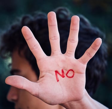 A palm written "No" on it Direct communication